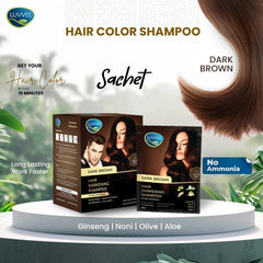 Luvvel Dark Brown Hair Color Shampoo sachets on a white platform with greenery in the background